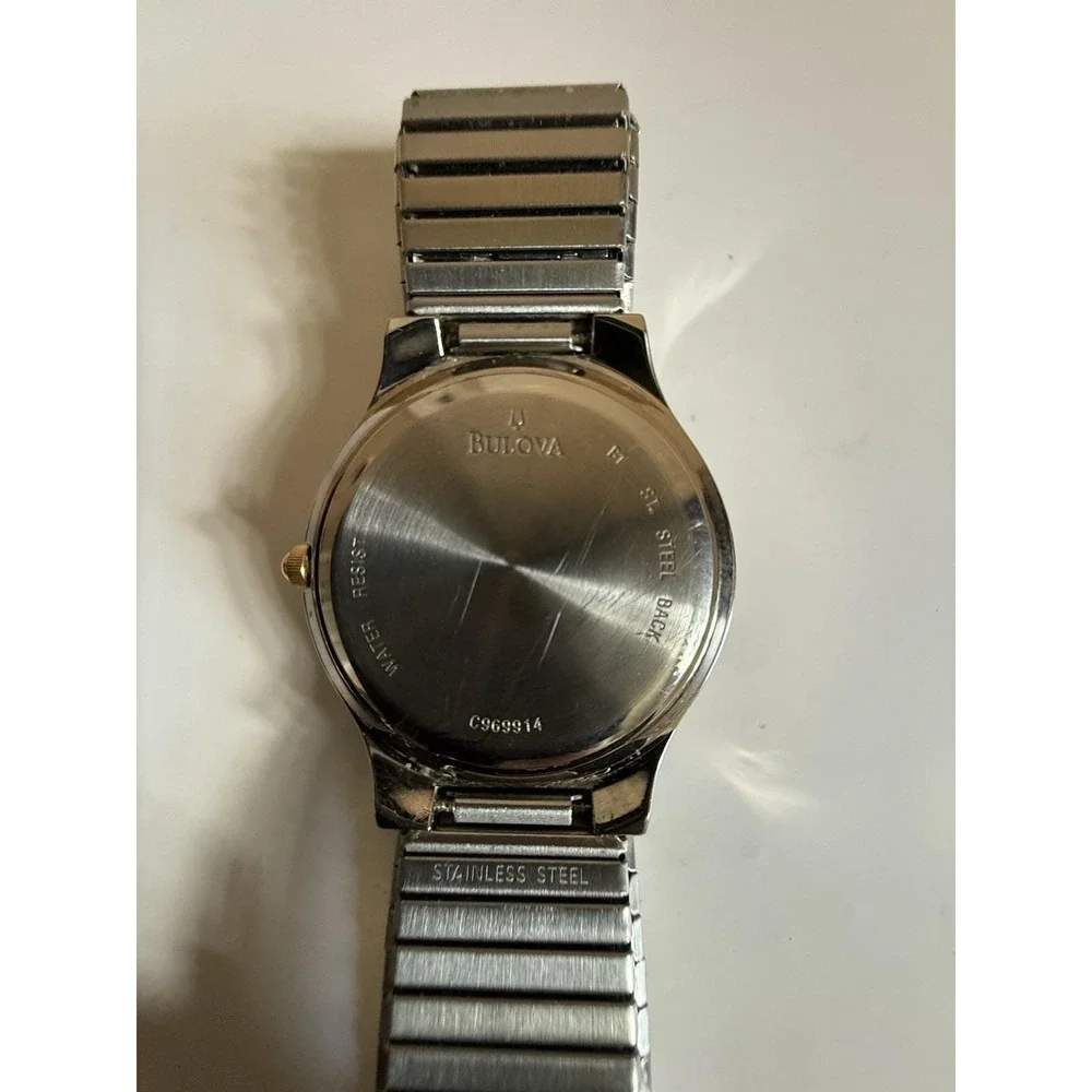 Caravelle by Bulova quartz watch — excellent condition, two-tone finish.